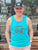 person wearing a meat-free hat and a turquoise tank top with The Herbivorous Butcher logo on it