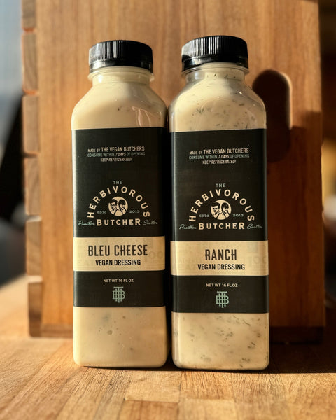 a bottle each of vegan dairy free bleu cheese and ranch dressing