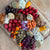vegan charcuterie board with plant based meat, dairy free cheese, veggies, crackers, and fruit